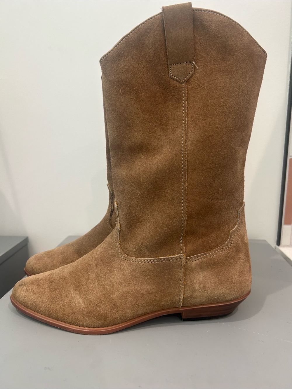 VINTAGE mid-calf western boots crafted in a brown "dirty suede" finish.